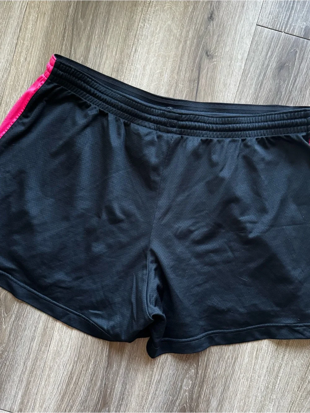 Nike Women's Black Shorts with Hot Pink Side Panels